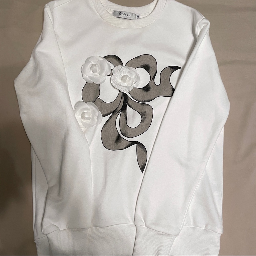 Camellia bow sweater